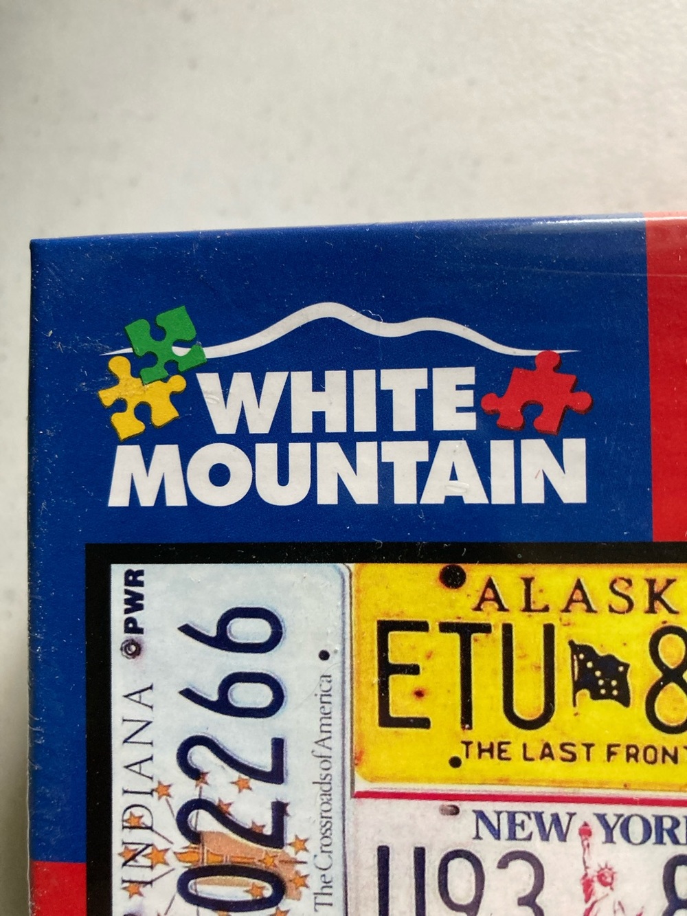 White Mountain 1000 pcs License Plates Jigsaw Puzzle - Picture 2 of 8